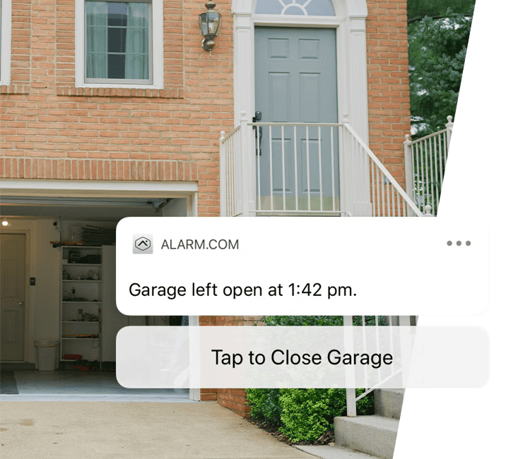 A brick house with an open garage, accompanied by an Alarm.com notification offering a quick option to close the garage remotely for convenience and security.