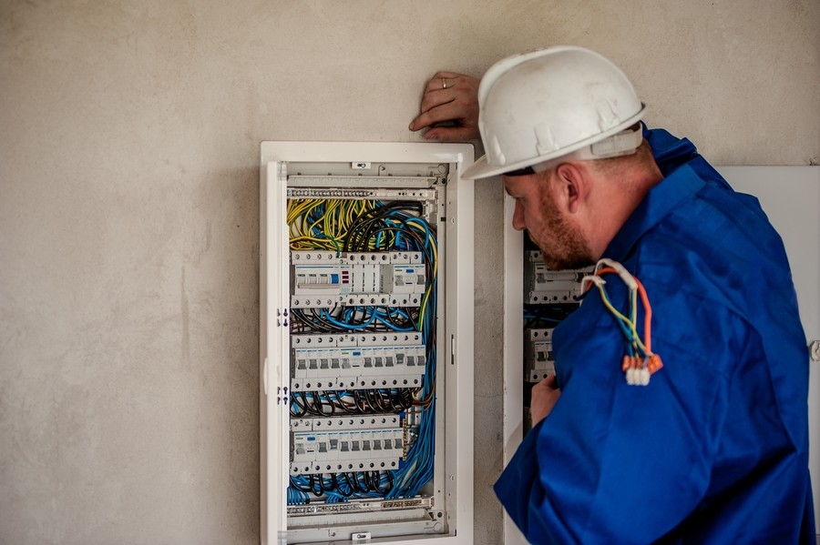 An electrical panel and low-voltage equipment installation showing proper coordination between electrical and technology systems.