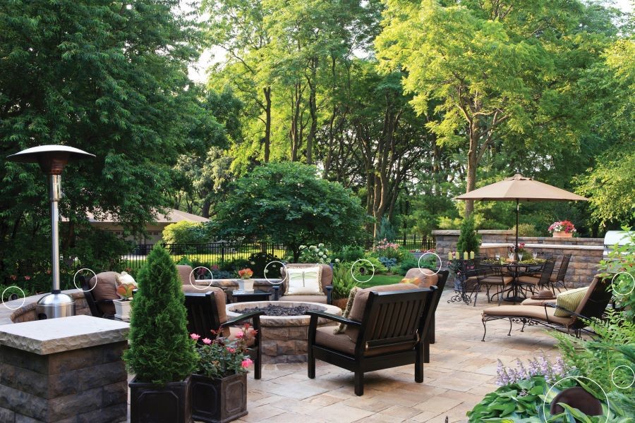 A backyard with numerous outdoor speakers digitally circled.
