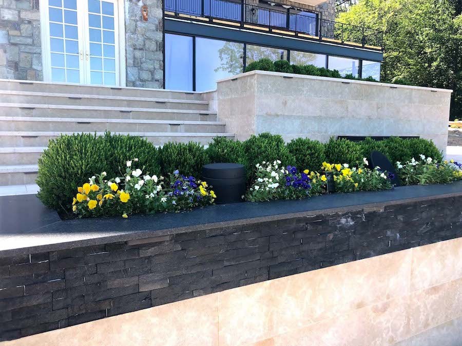 Coastal Source speakers blended into beautiful landscaping. 