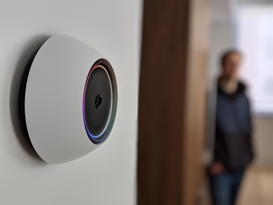 A beautiful home with a Josh.ai system on the wall.
