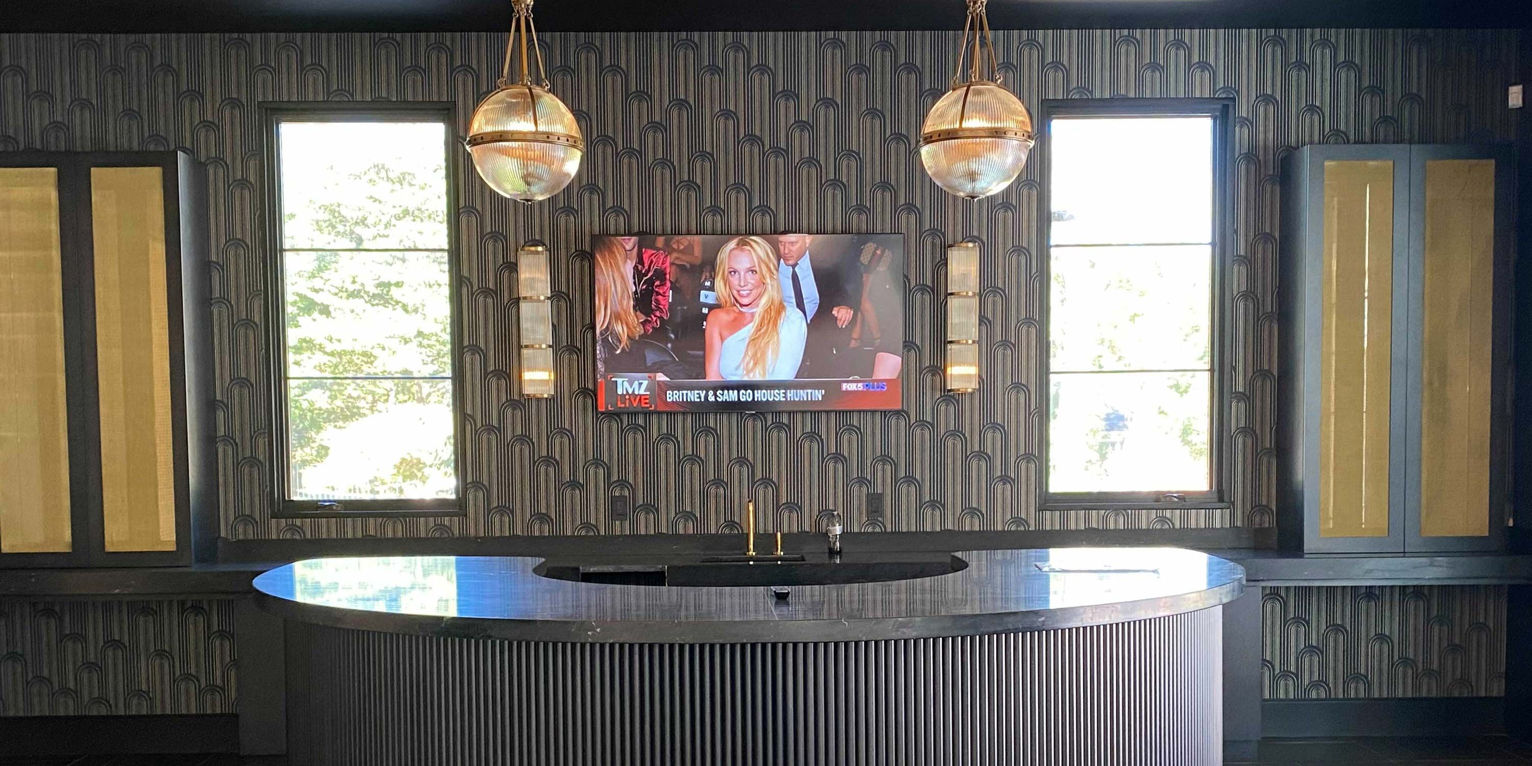 bar game room with modern windows